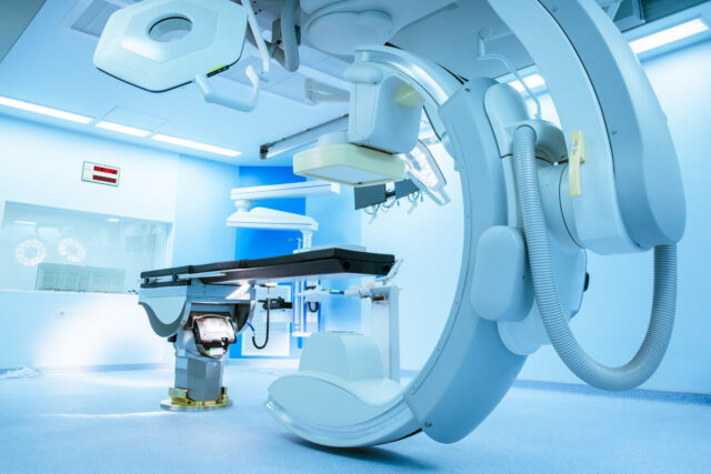 Equipment and medical devices in hybrid operating room blue filter. Operating room. Surgical procedures , the operating room of the Future. Equipment in hospital.